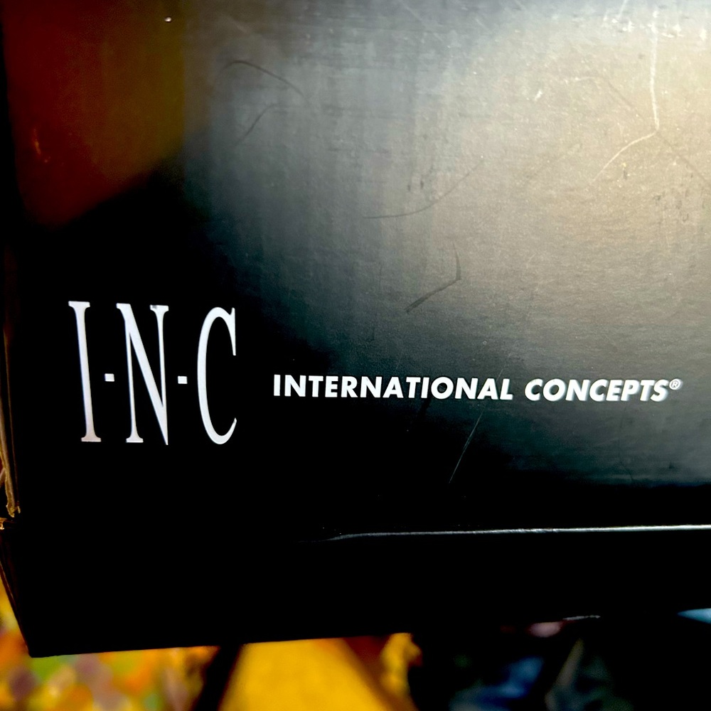 INC size 6 silver glitter boots.